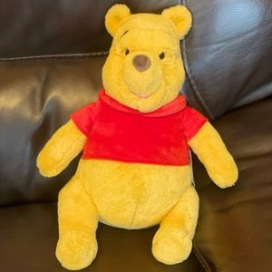 Plush Winnie the Pooh. Perfectly intact, NWT